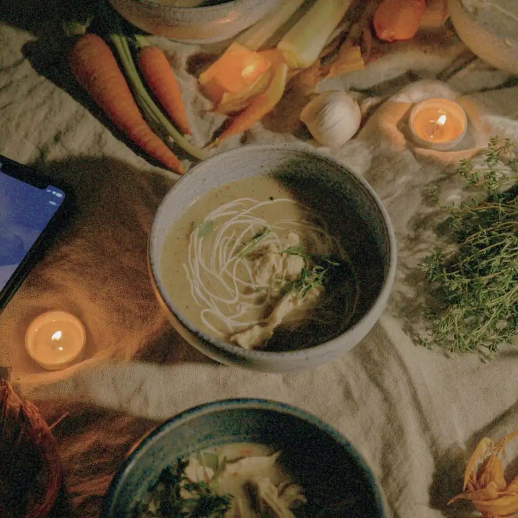 Plated Marry Me Chicken Soup with cream swirl and herbs